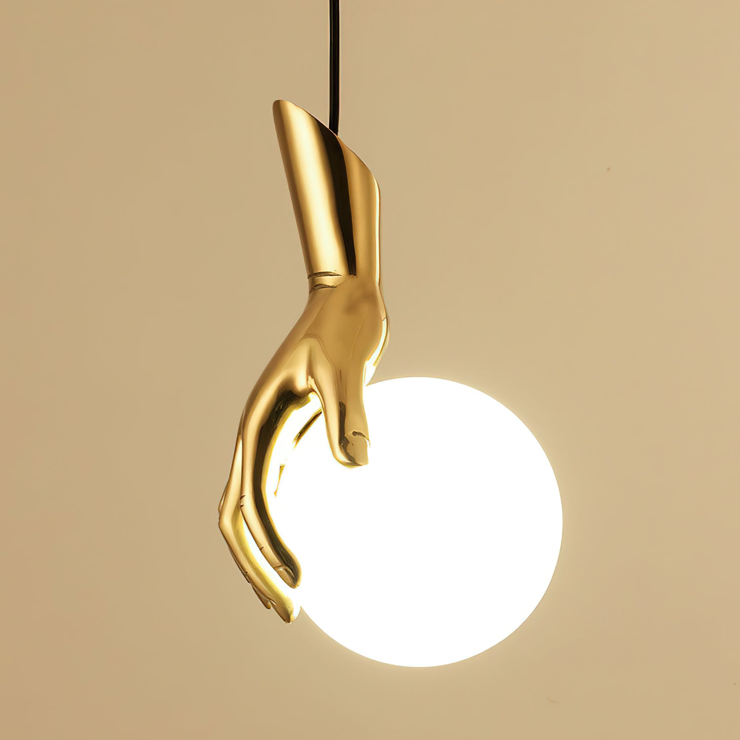 Hand Holding Globe Pendant Light | Esilora