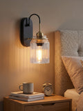 Modern Ribbed Brass and Glass Wall Sconce - Vanity Light for Bathroom Mirrors | Esilora