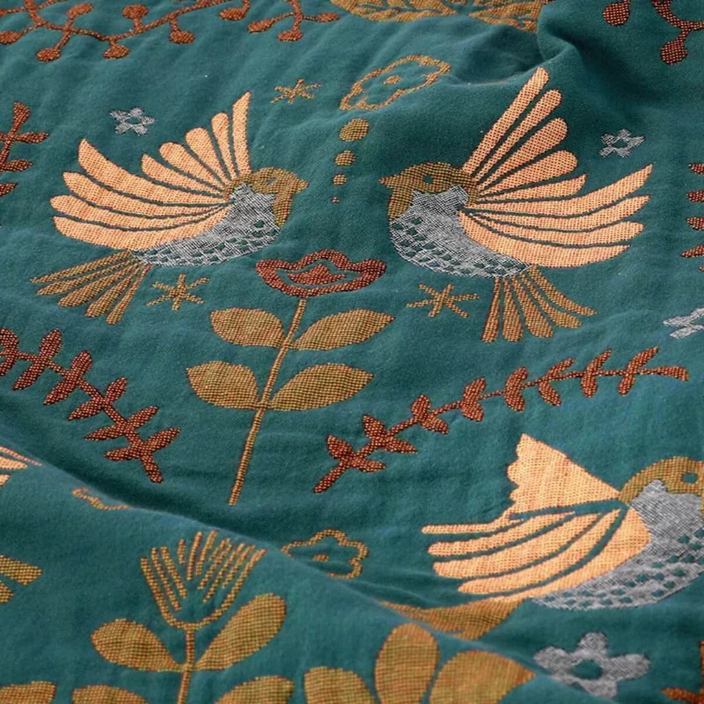 Coperta reversibile in cotone Ardelya con motivo a uccelli — design scandinavo morbido