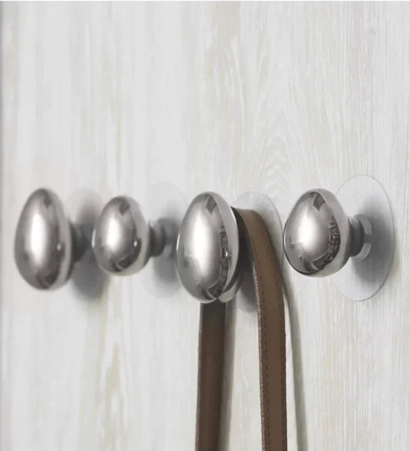 Ganchos de pared cromados en forma de gota Auriën, paquete de 2 — adhesivos o con tornillos