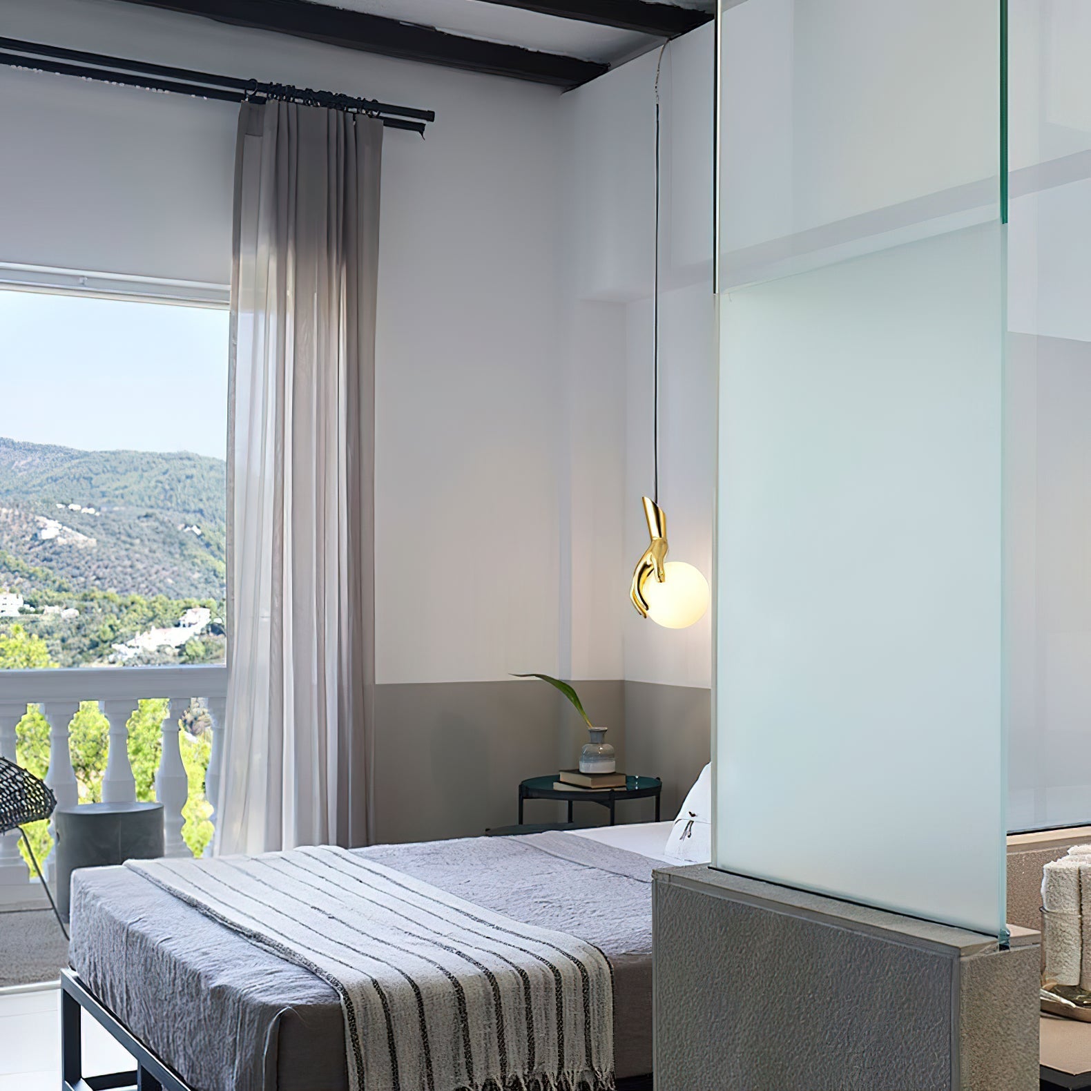 Hand Holding Globe Pendant Light | Esilora