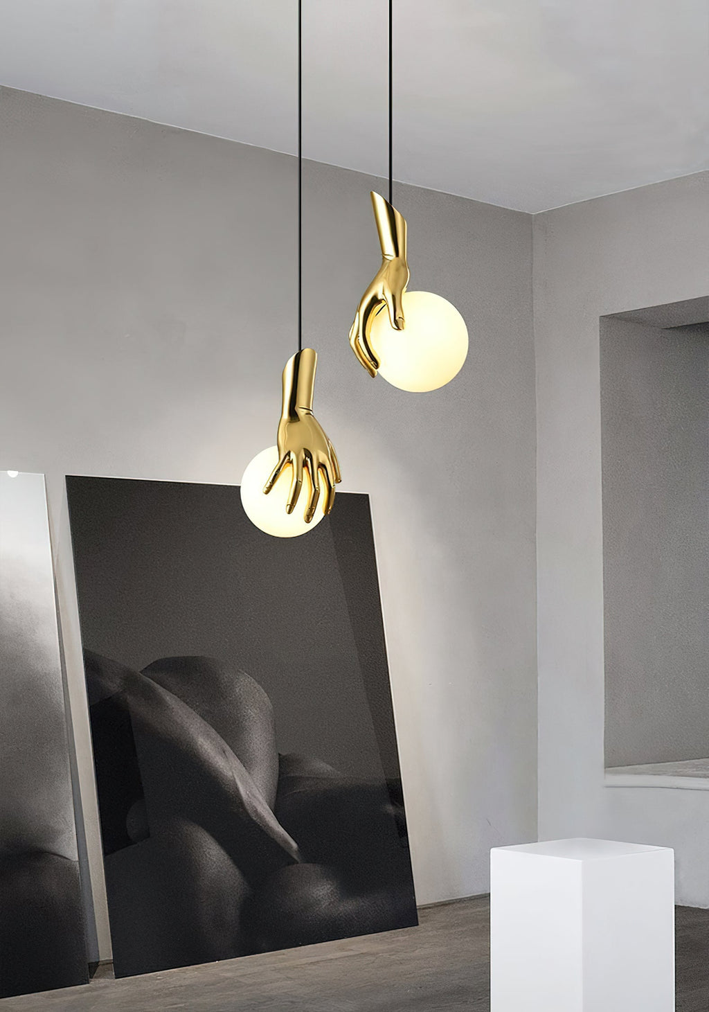 Hand Holding Globe Pendant Light | Esilora