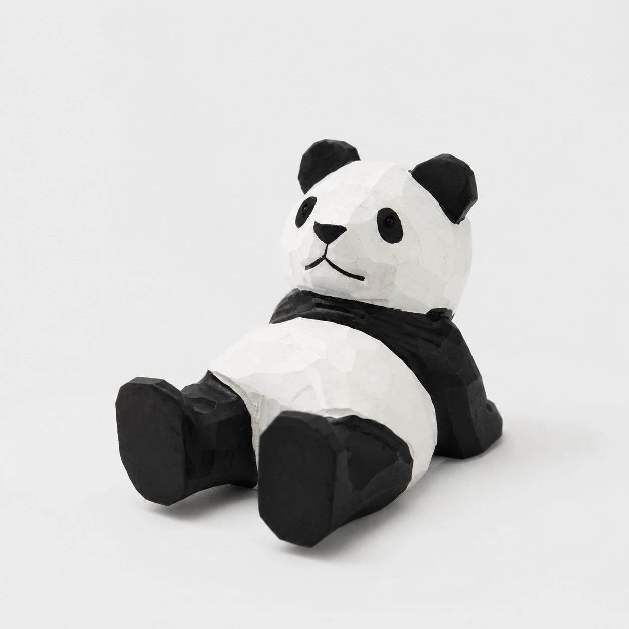 Support de téléphone en bois sculpté à la main représentant un animal | Esilora