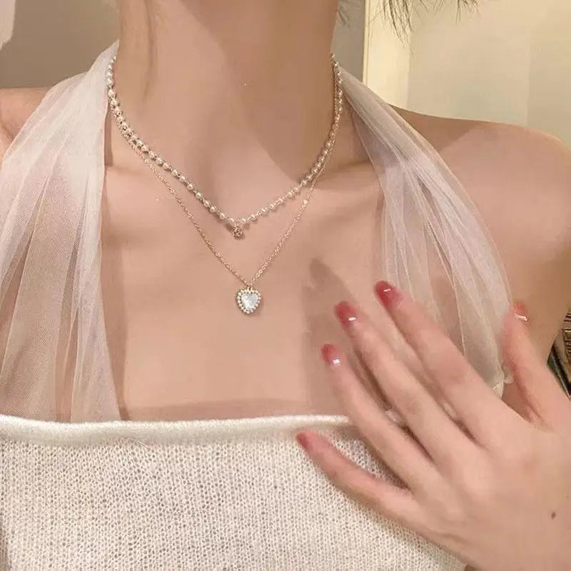 Aureline Perlen-Choker – Verstellbare goldfarbene Halskette mit glänzender Perle