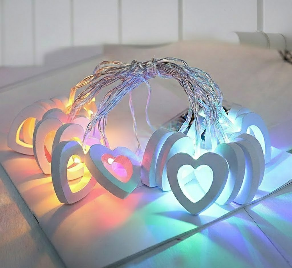 Guirnalda de luces LED en blanco cálido con diez estrellas de papel