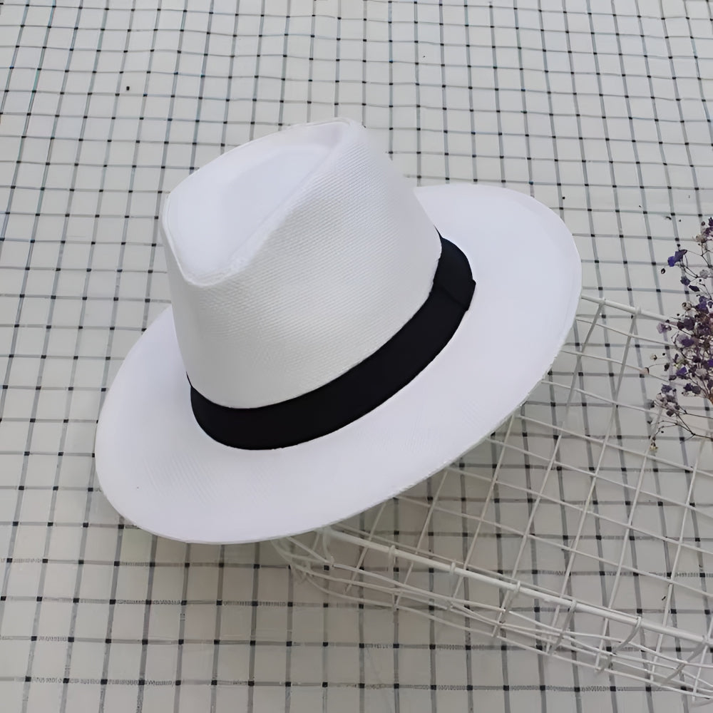 Letni kapelusz fedora typu panama z szerokim rondem — osłania całą twarz przed słońcem