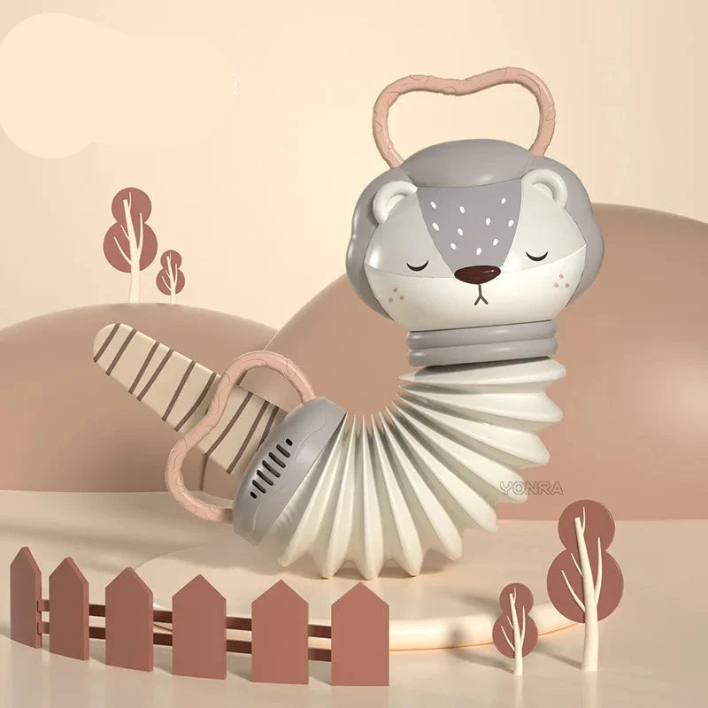 Baby 2-i-1 harmonikarangle — dyreform, bløde lyde