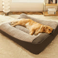 Large scratch‑resistant dog bed with orthopedic spine support