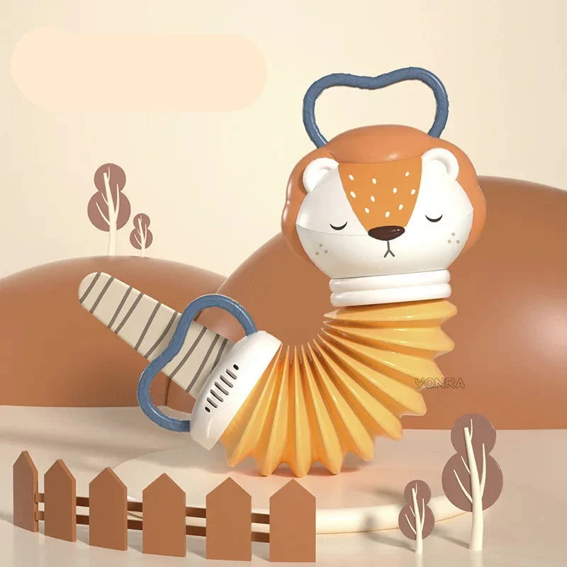 Baby 2-i-1 harmonikarangle — dyreform, bløde lyde