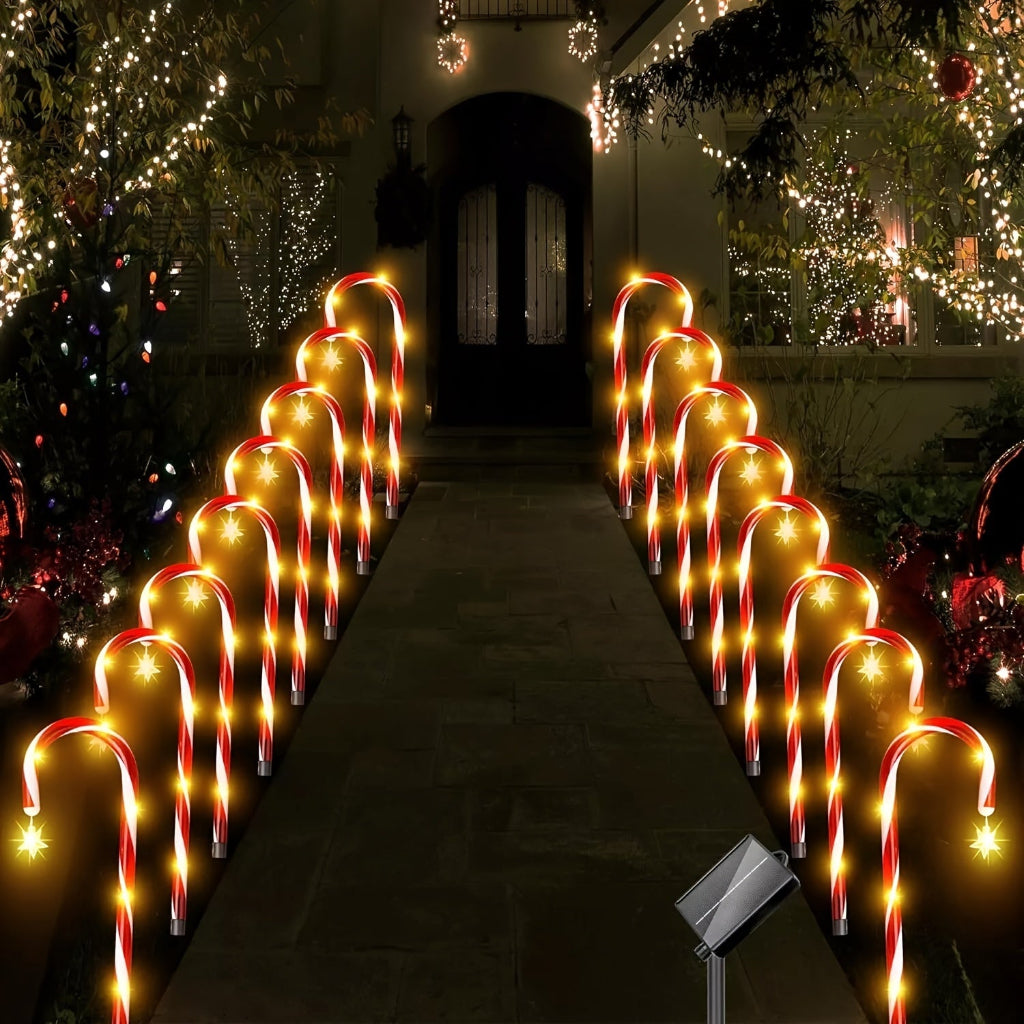 Luzes solares de plástico em forma de bengala doce, pacote de 12 — decoração de Natal com interruptor fotossensível automático