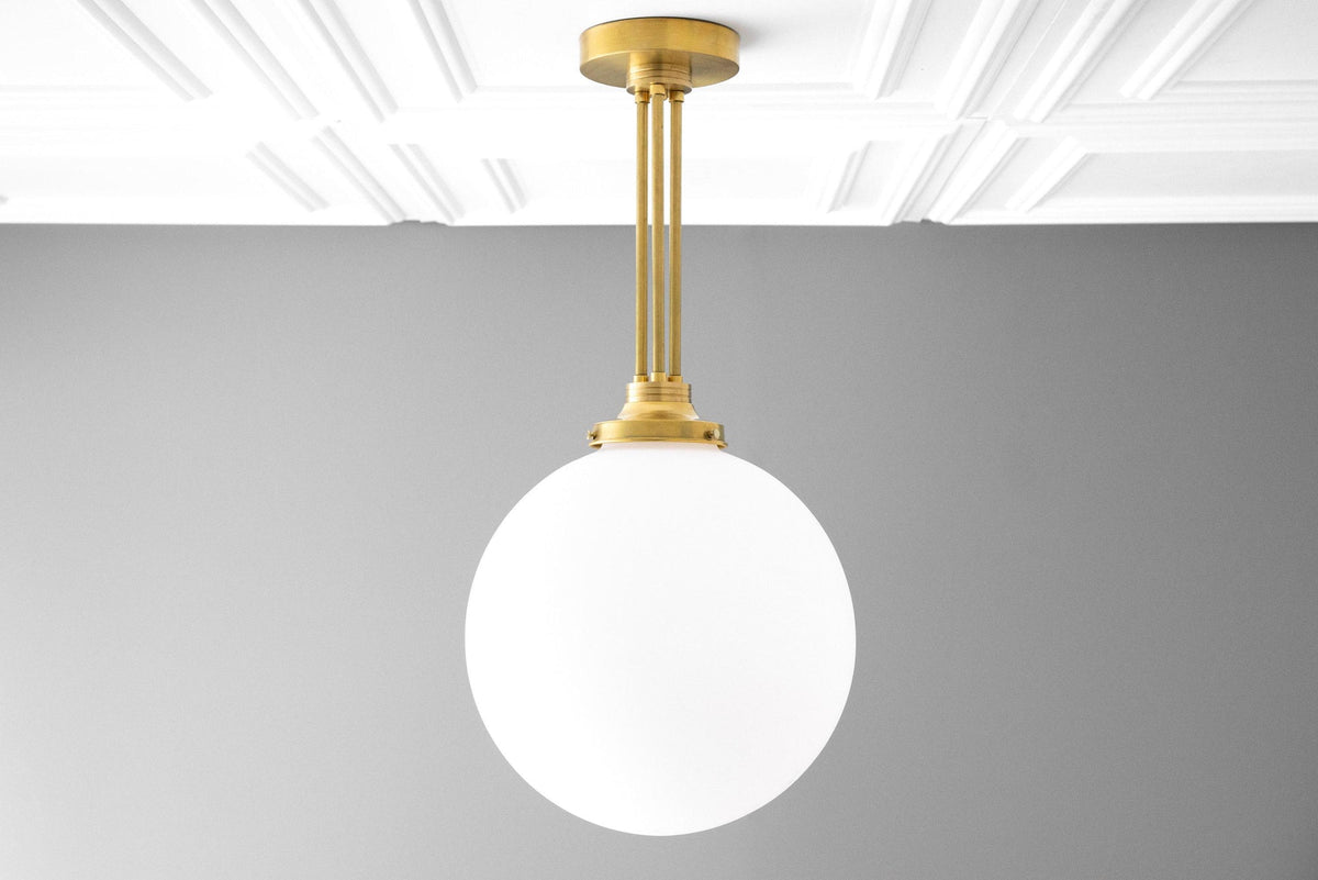 Lineární závěsné svítidlo Glorica Glass s elegantní řadou koulí - moderní stropní svítidlo ve stylu art deco do jídelny a kuchyně | Esilora
