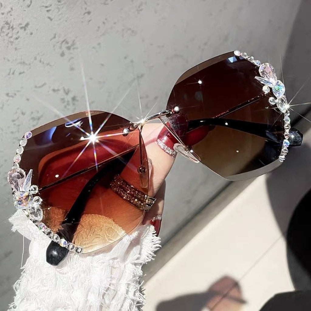 Óculos de sol sem aro para mulher — proteção UV, design leve com frente aberta