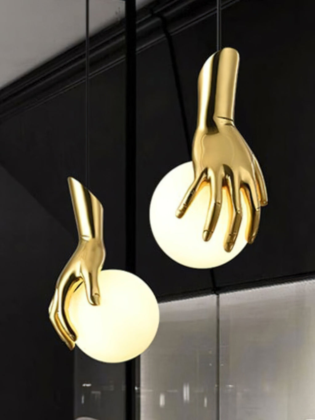 Hand Holding Globe Pendant Light | Esilora