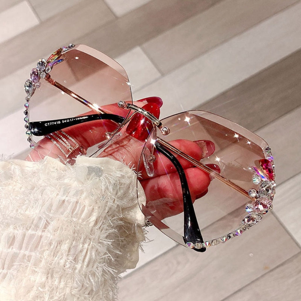 Óculos de sol sem aro para mulher — proteção UV, design leve com frente aberta
