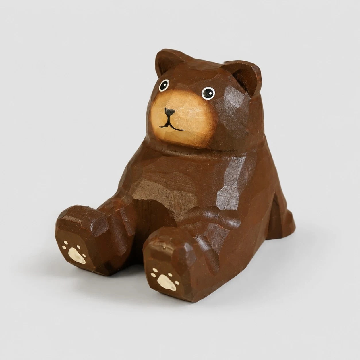 Support de téléphone en bois sculpté à la main représentant un animal | Esilora