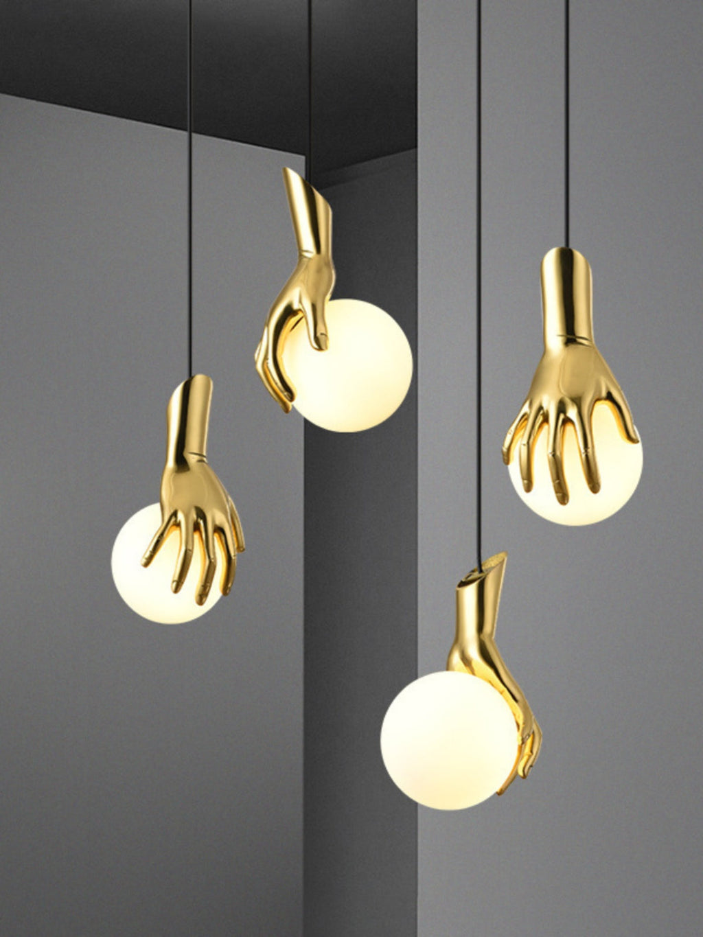 Hand Holding Globe Pendant Light | Esilora