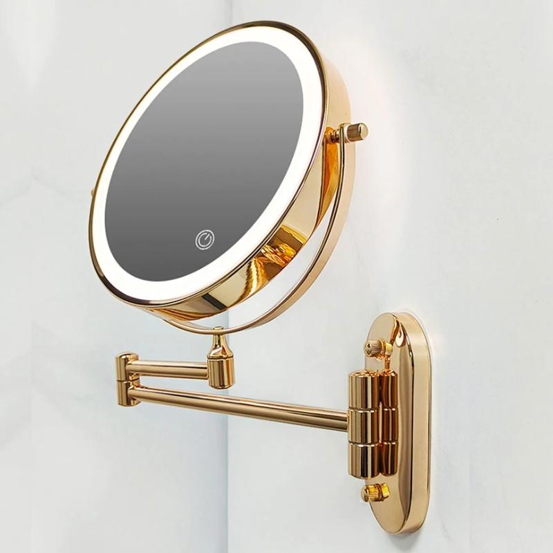 Oglindă cosmetică LED montată pe perete - finisaj auriu, cu mărire