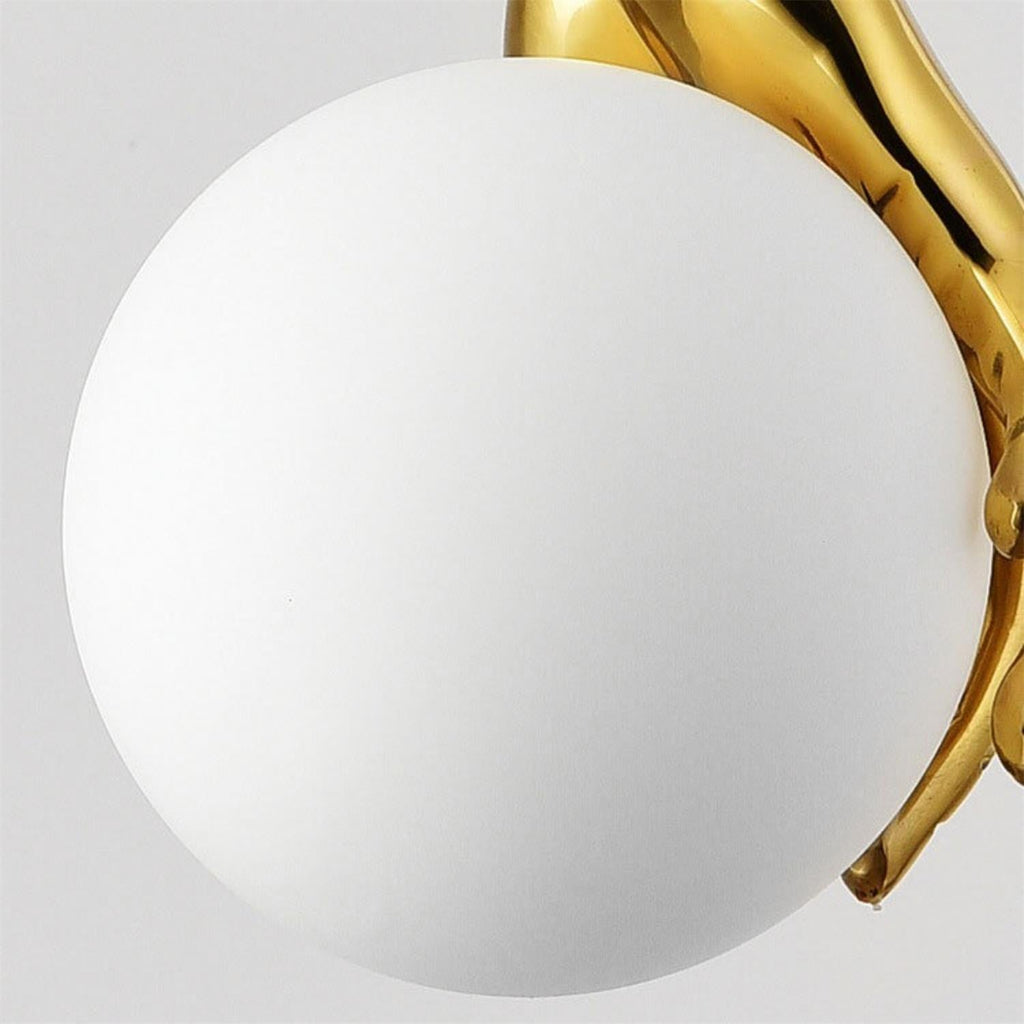 Hand Holding Globe Pendant Light | Esilora