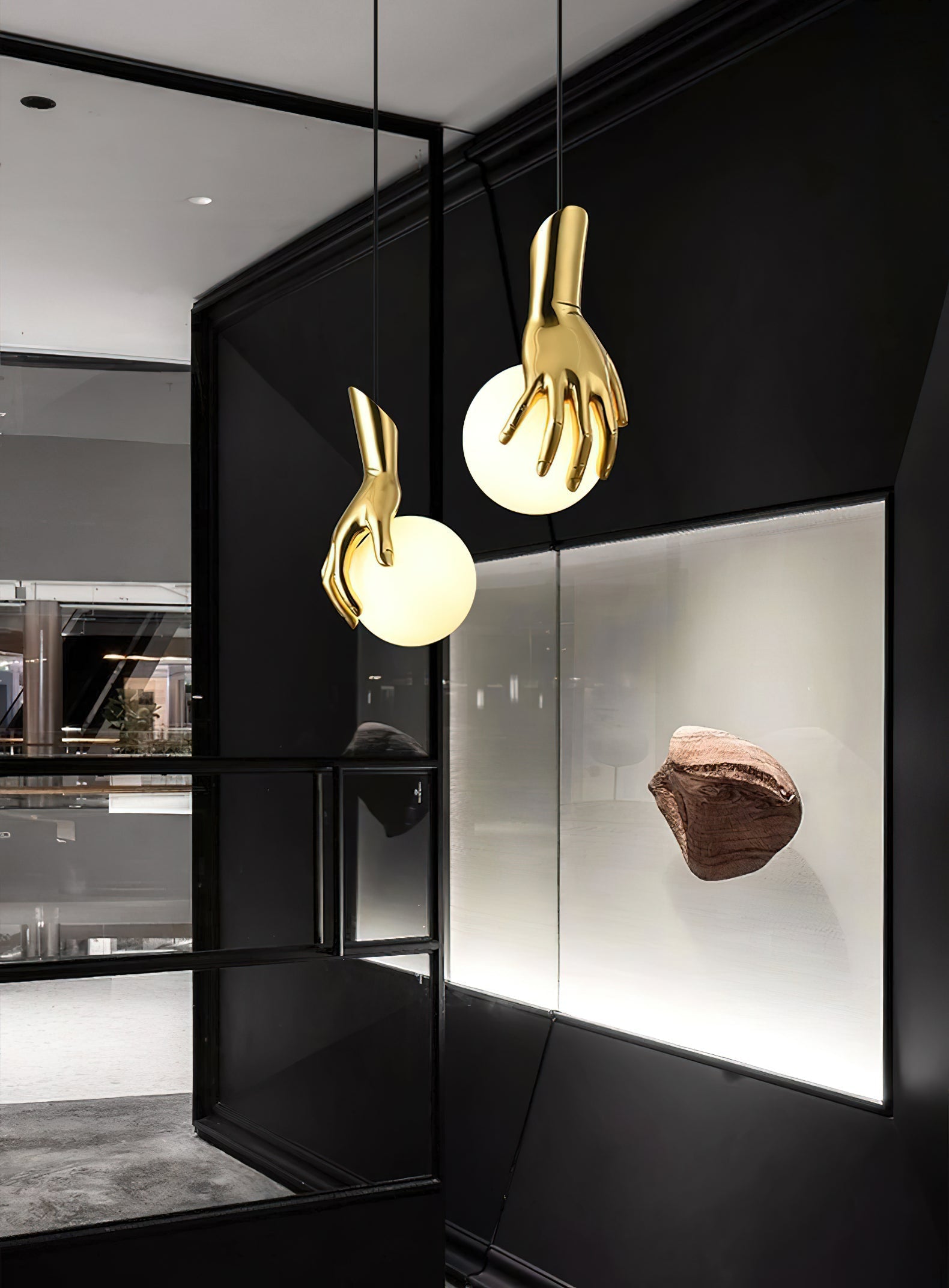 Hand Holding Globe Pendant Light | Esilora