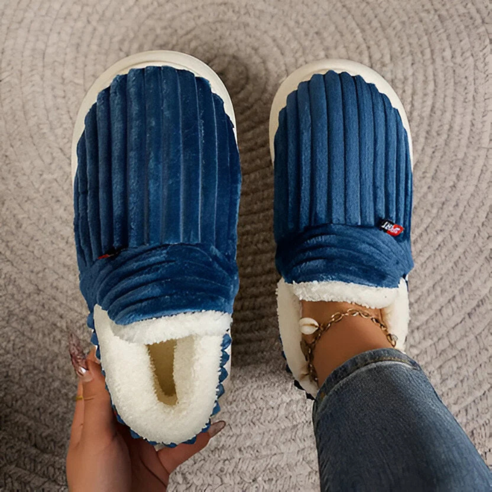 Mjuka tofflor med mysigt varmt foder och halkfria sulor