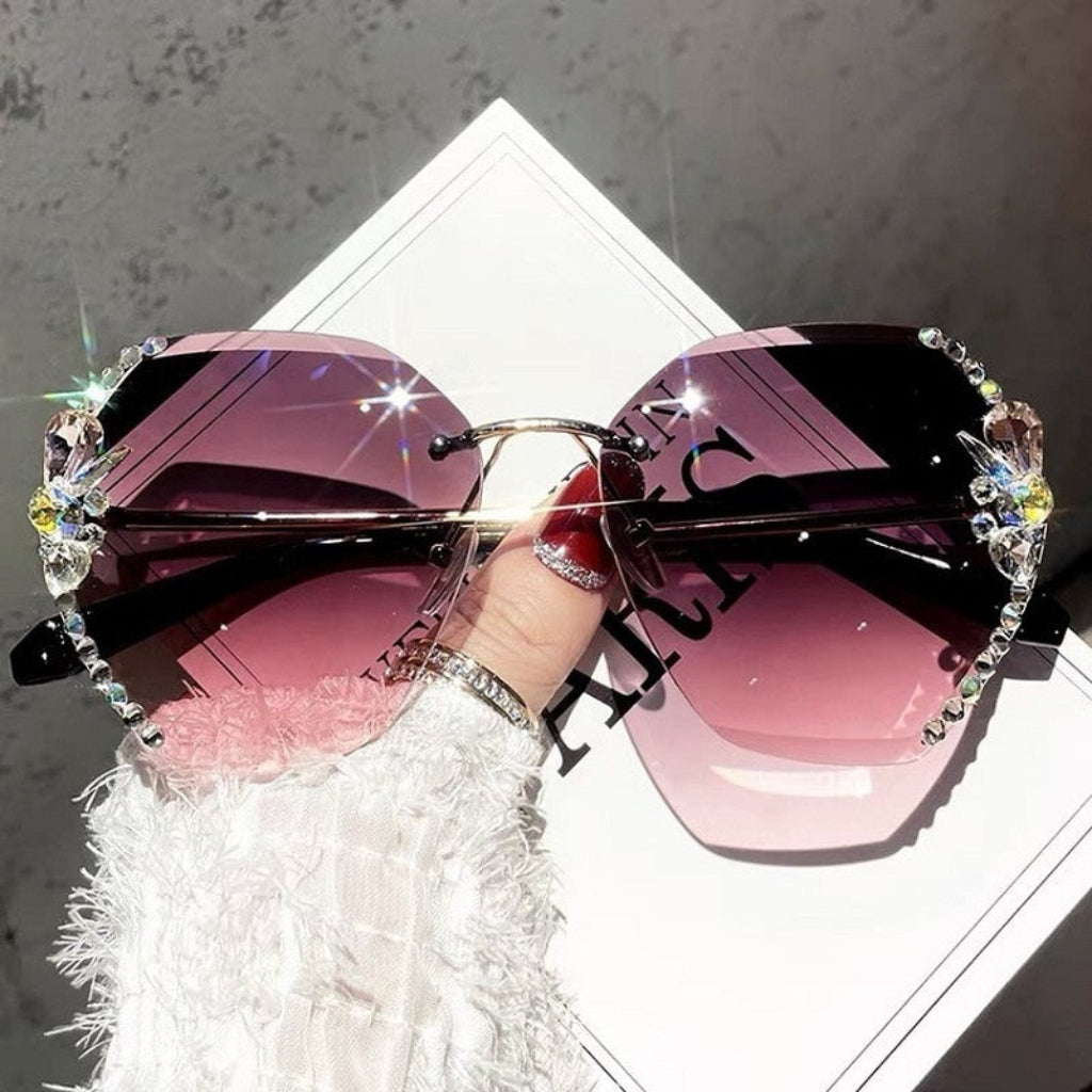 Óculos de sol sem aro para mulher — proteção UV, design leve com frente aberta