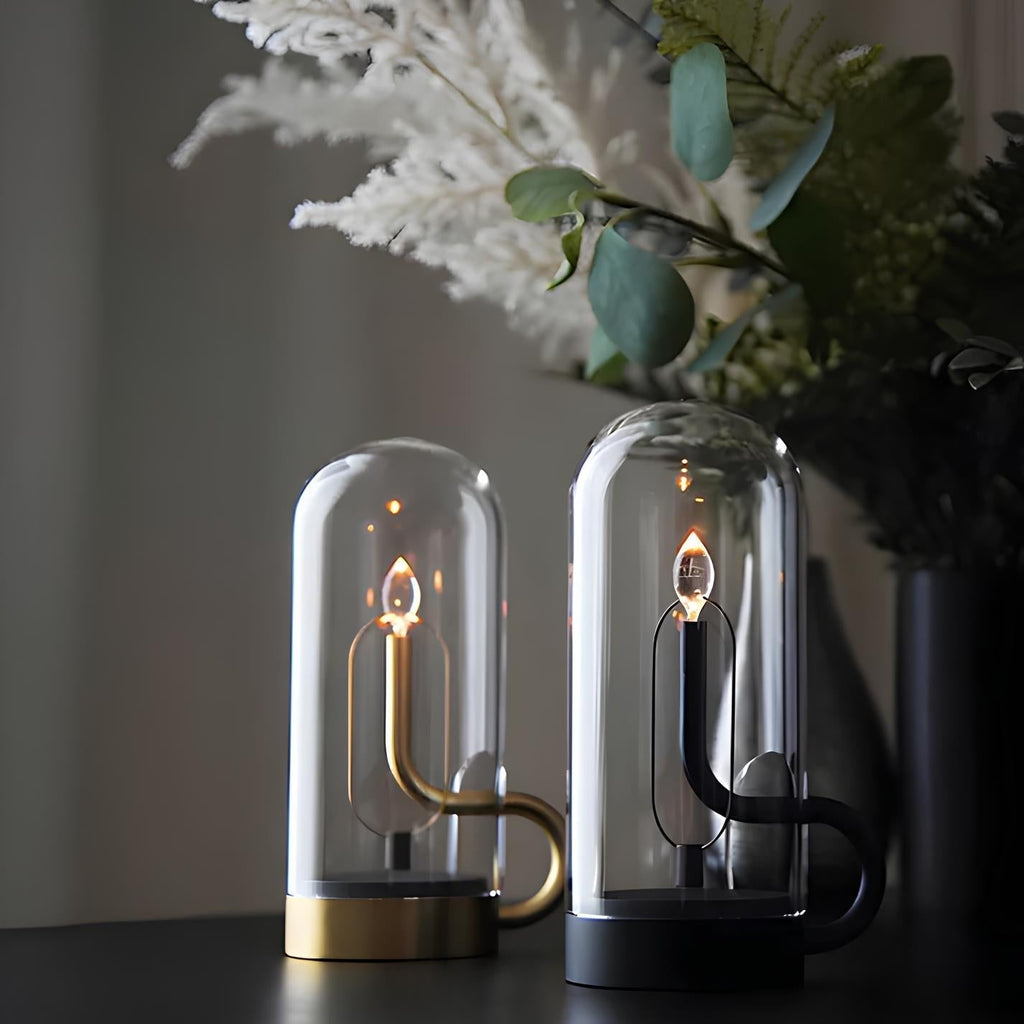 LED-bordslampa i glas — kinetiskt svängande hölje, magnetisk pendellampa