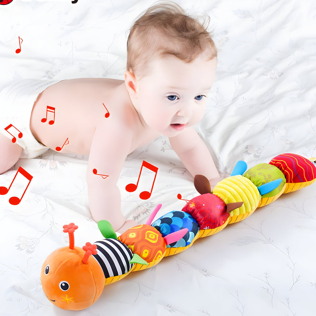 Kleurrijke pluchen rammelaar voor baby's — melodieën bij het knijpen