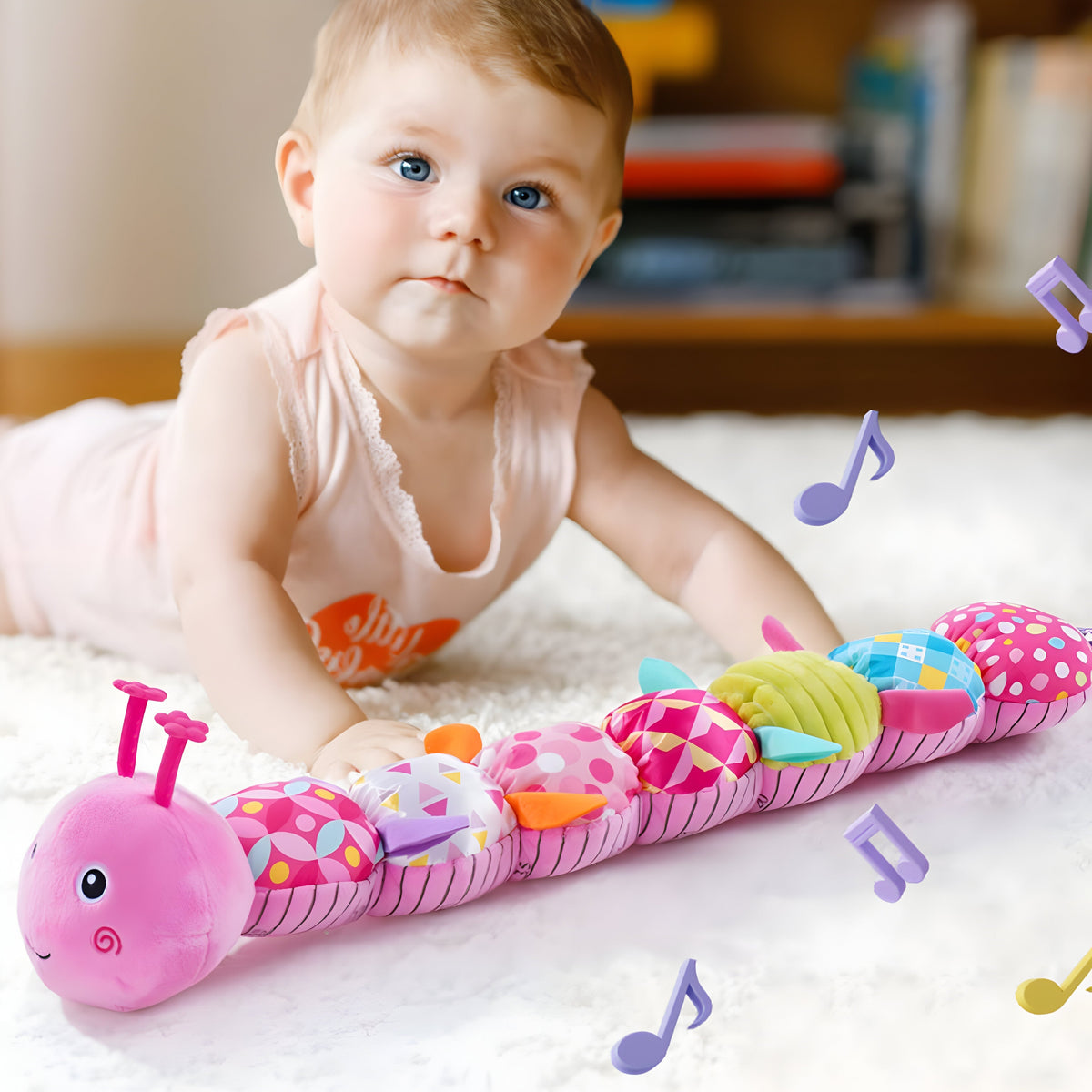 Kleurrijke pluchen rammelaar voor baby's — melodieën bij het knijpen