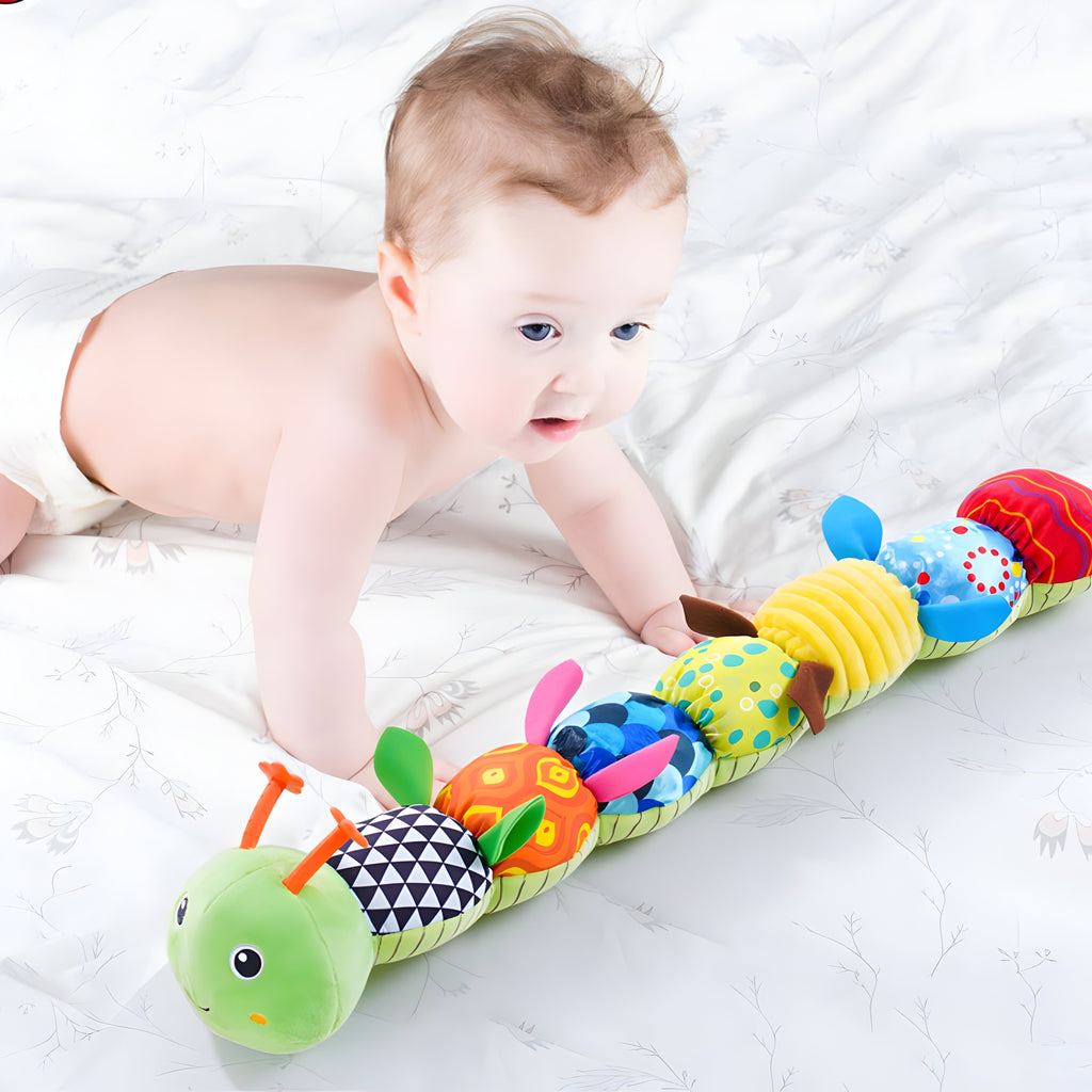 Kleurrijke pluchen rammelaar voor baby's — melodieën bij het knijpen